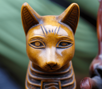Yellowish Egyptian cat statue